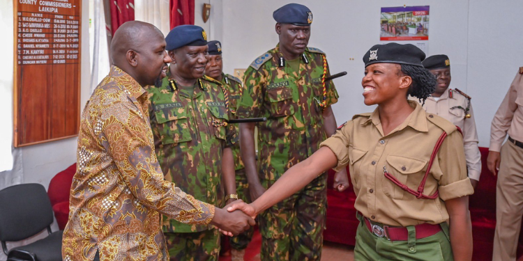 Kenyan Cop Who Served As Only Woman In Banditry-Hit Region Promoted A Photo Of Corporal Winfred Gacheri During Her Promotion Ceremony Alongside Inspector-General Douglas Kanja And Interior Cabinet Secretary Kipchumba Murkomen. Photo/Interior