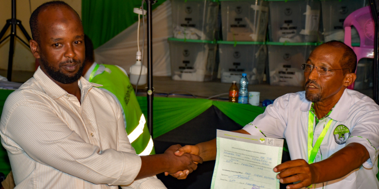 Opinion | Why Goonism And Voter Suppression Threaten Kenya’s Democracy A Photo Of Tubi Mohammed Tubi Receiving His Certificate After Being Declared The Member Of Parliament For Isiolo South Constituency. Photo/Iebc