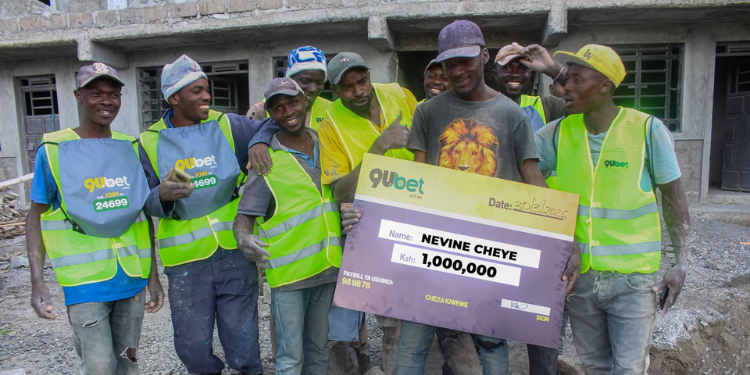 Ruai Mjengo Worker Wins Ksh 1,000,000 From Ksh 20 On 9Ubet Aviator Game Ruai Worker Nevine Chenye Displaying Ksh 1 Million Cheque Alongside His Workmates. Photo/ File
