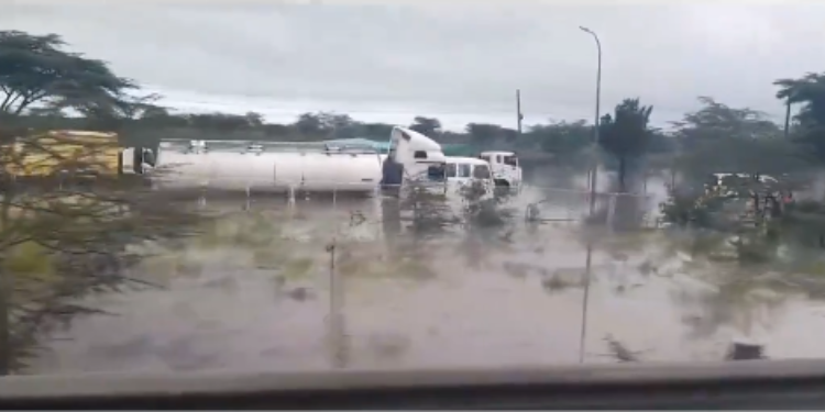 Vehicles Submerged In Water Along Mombasa Road. Photo/ Obuchunju X