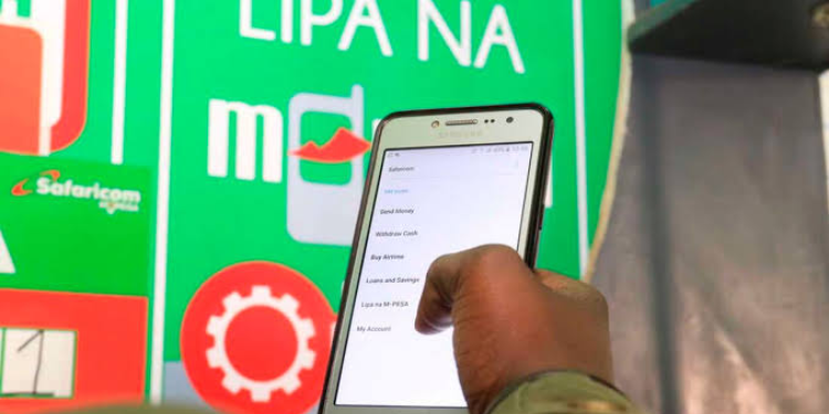 A Person Making An M-Pesa Transaction. Photo/Nation