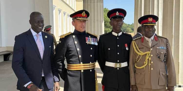 Kenyan Army officer Second Lieutenant Isaac Lenkume, Kenya’s High Commissioner to the United Kingdom, Maurice Makoloo, with other Army officers PHOTO/Maurice Makoloo