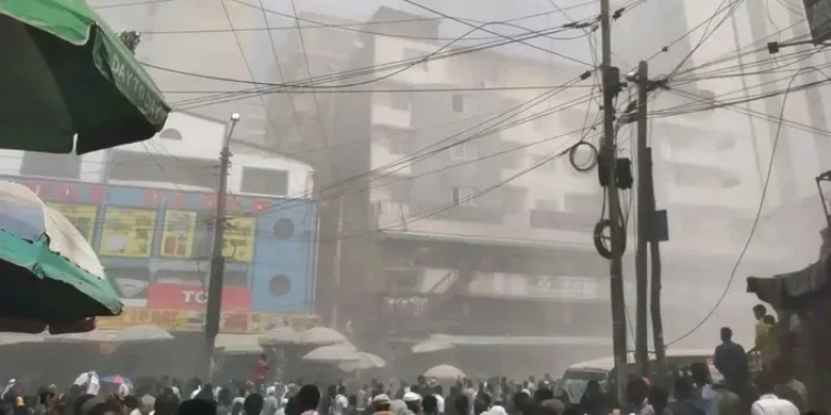 The debris from the collapsed building in Eastleigh on Friday, October 23, 2026 and people gathering around the building. PHOTO/Citizen