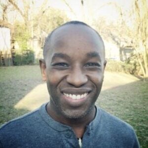 Head And Shoulders Of A Smiling Kanyi