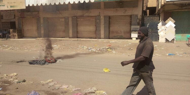 Sudanese Barricade Streets, Close Shops After 7 Killed Shops Are Seen Closed In Khartoum'S Sajane Market On January 18, 2022, As Part Of A Civil Disobedience Campaign Following The Killing Of Seven Anti-Coup Demonstrators, Including A Merchant From The Market | Afp