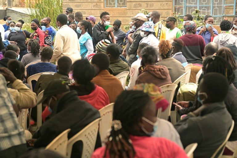 People Wait To Be Vaccinated Against Covid-19 At Ngando Informal Settlement In Nairobi During A Mass Vaccination | Afp