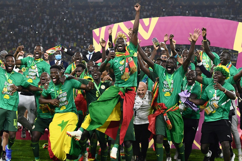 Senegal Celebrate With The Trophy After Winning Their First Africa Cup Of Nations Title | Afp