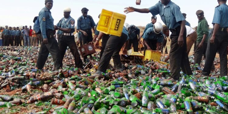 Nigeria Islamic Police Destroy Nearly 4 Mn Beers Hisbah Religious Police Often Destroy Alcohol, As Here In A Previous Crackdown | Afp
