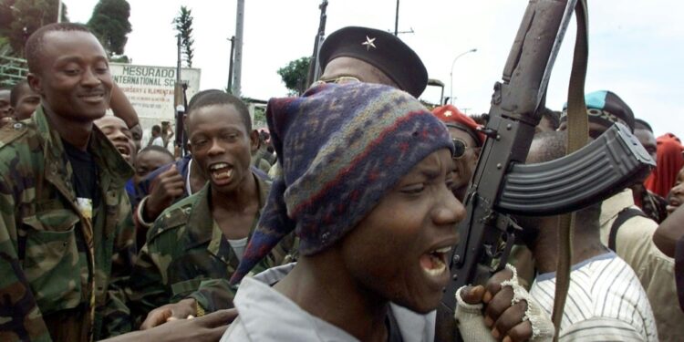 Lurd Rebels Are Seen In August 2003 Near A Monrovia Suburb | Afp