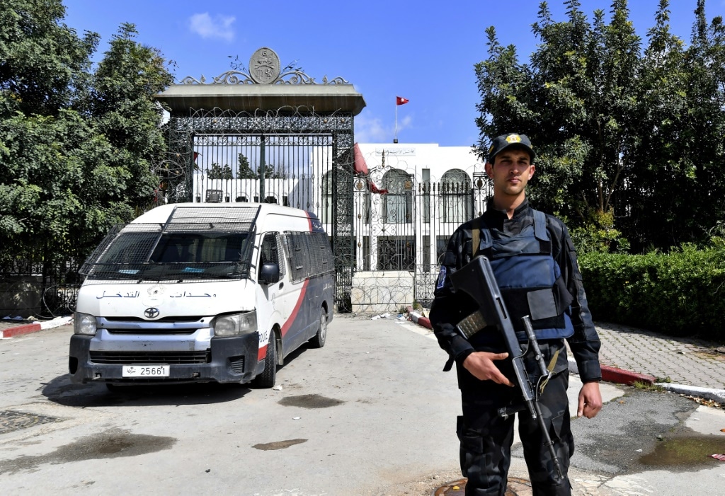 A Tunisian Officer Stands Guard Outside Parliament In Tunis On March 31 | Afp