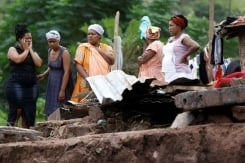 'My Daughter, My Sisters': S.africa Flood Survivor Mourns Lost Family