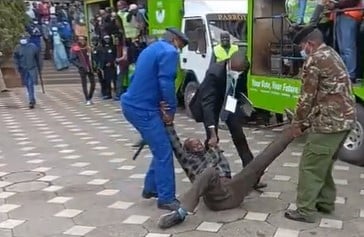 Police Whisk Away The Protestor From Iebc'S Tuesday, July Meeting At Kicc, Nairobi.photo/Courtesy