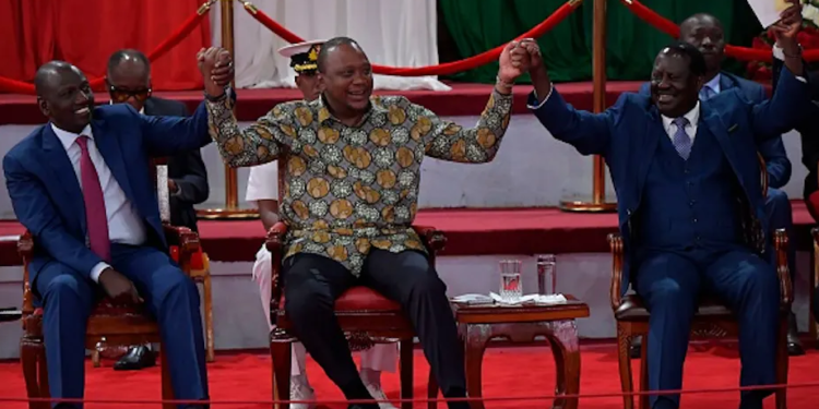 Uhuru Kenyatta (Centre) Holds Hands With Opinion Polls’ Favourites, Deputy President William Ruto (Left) And Former Prime Minister Raila Odinga | Tony Karumba/Afp Via Getty Images