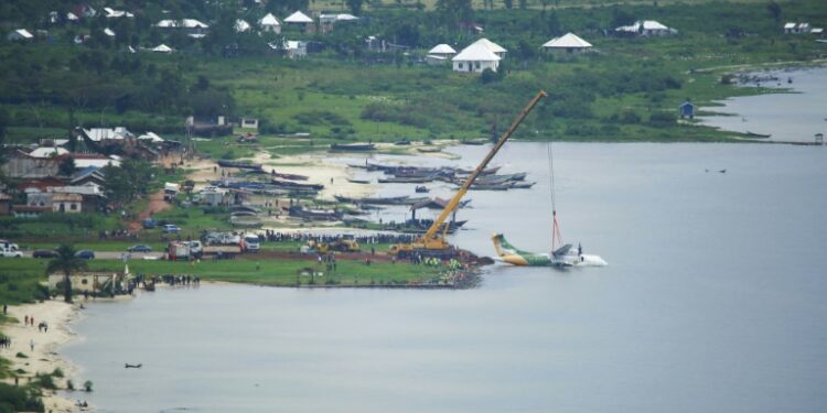 Tanzania Plane Wreckage Removed From Lake Victoria A Crane Removes The Crashed Precision Air Aircraft From Lake Victoria At Bukoba, Tanzania | Afp