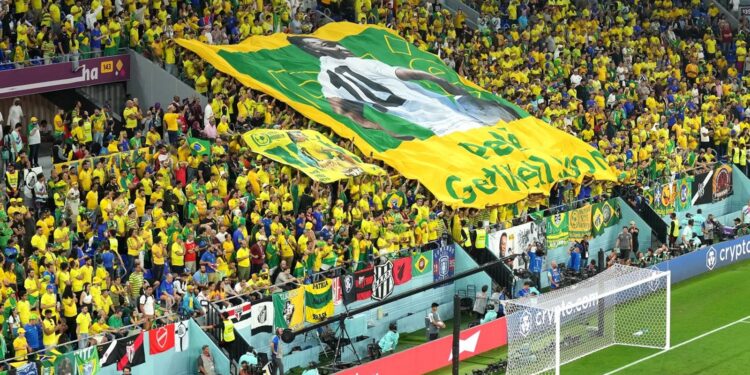 Brazilian Fans Showing A Flag Featuring Football Legend Pele Saying 'Get Well Soon'
Photo: Courtesy
