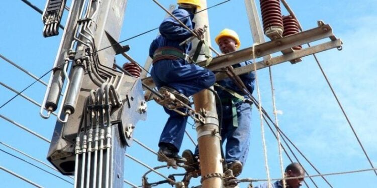 Kplc Technicians Fixing A Power Line.photo/Courtesy