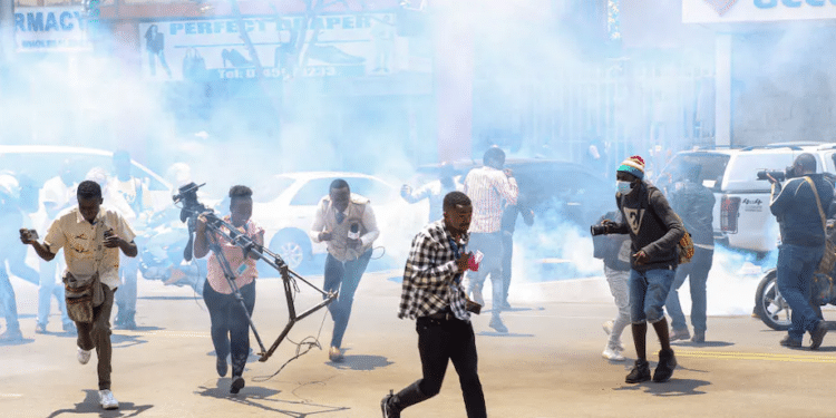 From Advertising Blackmail To Physical Threats, Kenya’s Journalists Are Under Attack – But They Must Also Regain Public Trust Journalists Take Cover During March 2023 Protests In Kenya | Boniface Muthoni/Sopa Images