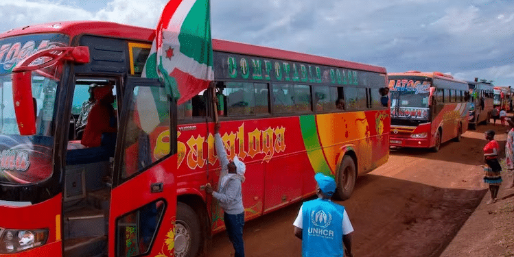 The Burundian Flag Flies At The Head Of A Convoy Of Buses Moving Refugees Back Home From Tanzania In 2019 | Tchandrou Nitanga/Afp Via Getty Images