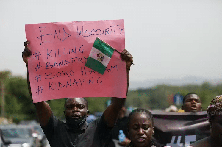 Parents And Relatives Of Students From The Federal College Of Forestry Mechanization In Kaduna, Who Were Kidnapped, Hold Placards During A Demonstration In Abuja On May 4, 2021. | Kola Sulaimon/Afp Via Getty Images