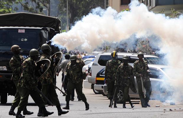 Police Officer Battles Protesters.