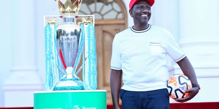 President William Ruto With The Premier League Trophy. Photo/Pcs.
