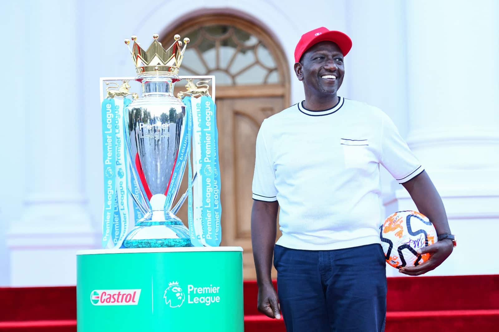 President William Ruto With The Premier League Trophy. Photo/Pcs.