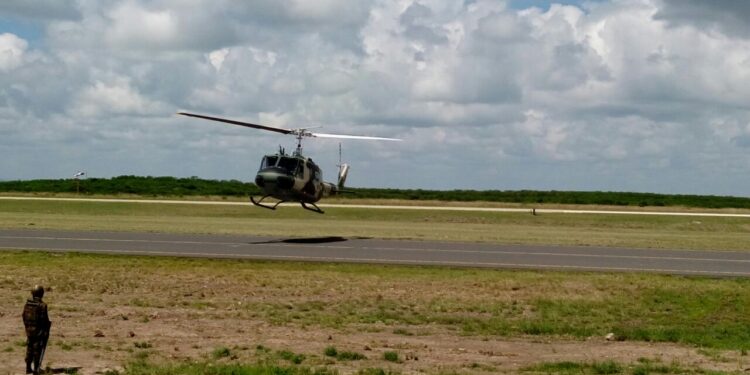 An Old Photo Of A Huey Chpper Landing At Laikipia Airbase In Nanyuki. 