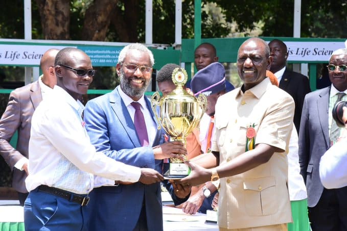 The Vc, Prof. Kiama And Chair Of The Show Committee, Dr. George Abong' Receiving A Trophy From President Ruto At The Nairobi International Trade Fair 2023 On Wednesday 27,2023 Photo/Uon