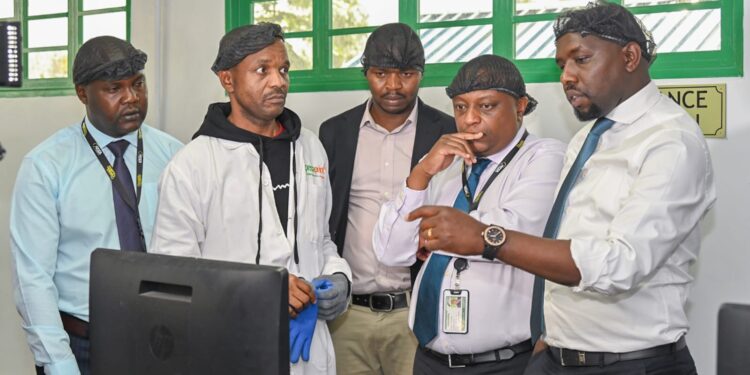 Transport Cs Kipchumba Murkomen (Right) Nteracts With Ntsa Staffers At The Agency'S Headquarters.