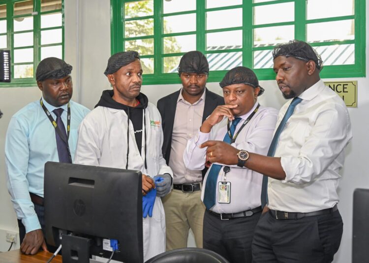 Transport Cs Kipchumba Murkomen (Right) Nteracts With Ntsa Staffers At The Agency'S Headquarters. 