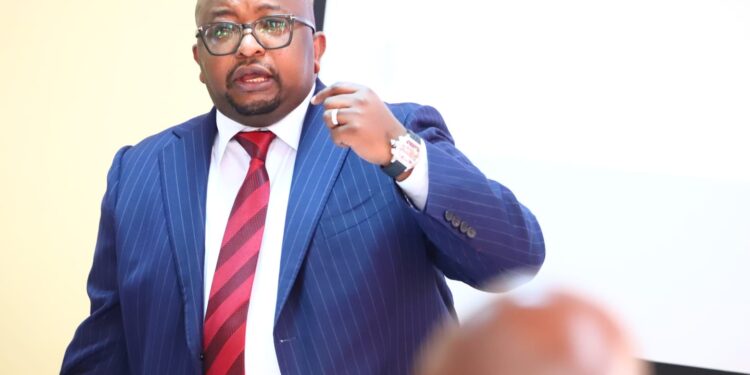Housing Ps Charles Hinga Speaks During A Past Meeting.