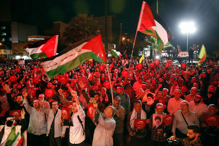 Iranians Wave Palestinian Flags During A Celebration Of The Hamas Attack Against Israel In Tehran.