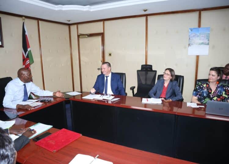 Education Cabinet Secretary Ezekiel Machogu (Center) Holds Discussions With Bmw Representatives At His Jogoo House Offices. 