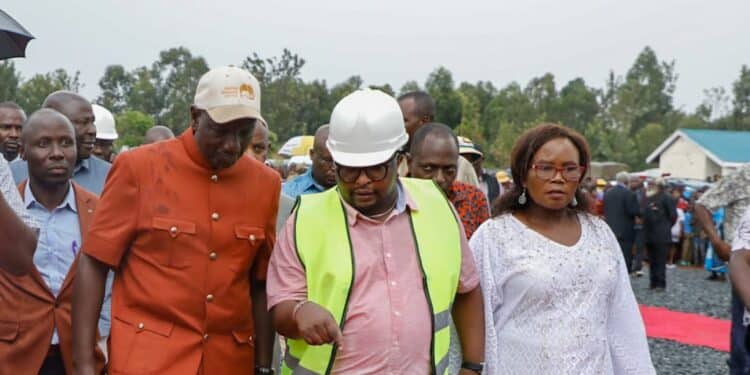 President William Ruto (Left) Chats With Housing Ps Charles Hinga During The Launch Of A Past Housing Project. 