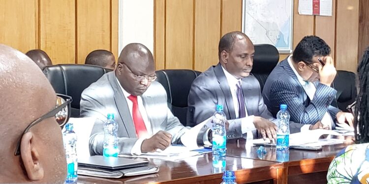 Cs Chelugui Speaks After Links To Company Behind Eldoret Job Scandal Cooperatives Cabinet Secretary Simon Chelugui (In Red Tie) Attends A Past Meeting.