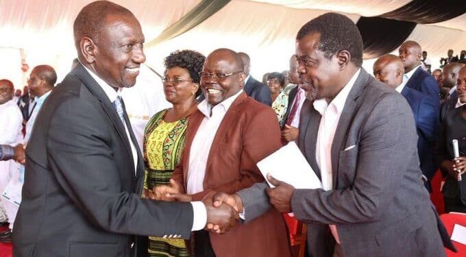 President William Ruto Shakes Hands With Busia Senator Okiya Omtatah. Photo/ Courtesy.