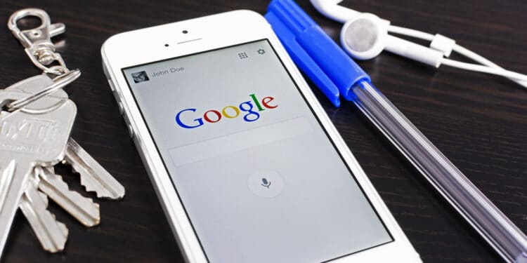 Google. An Image Of Google Search Engine On A Mobile Phone. An Image Of Google Search Engine On A Mobile Phone.