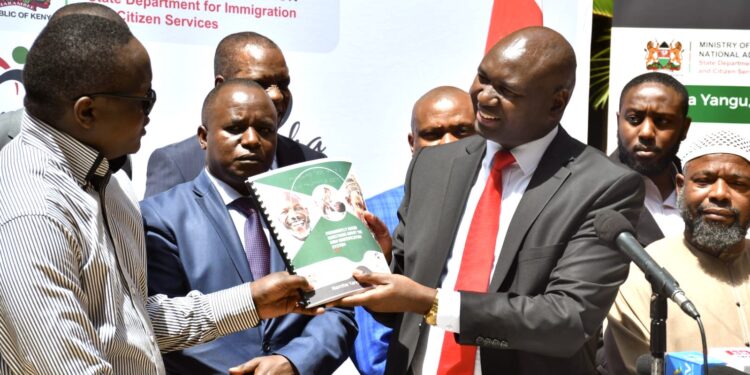 Immigration And Citizen Services Ps Julius Bitok (Right) Leads Other Stakeholders In Receiving Submissions From The Civil Society In Kenya Regarding Digital Ids Or Maaisha Card System. 