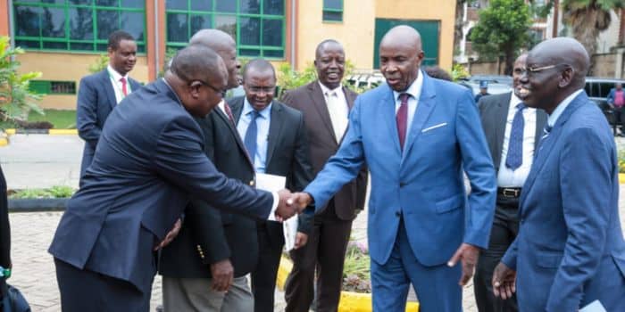 Education Cs Ezekiel Machogu (Center) And Ps Belio Kipsang Arrive At The Mtihani House Knec Headquarters On November 23, 2023. 