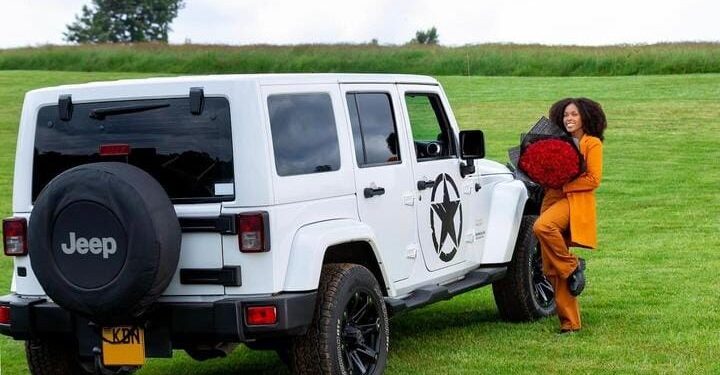 Actress Jacky Vike Also Known As Awinja Poses With Her Brand New Jeep Car. 