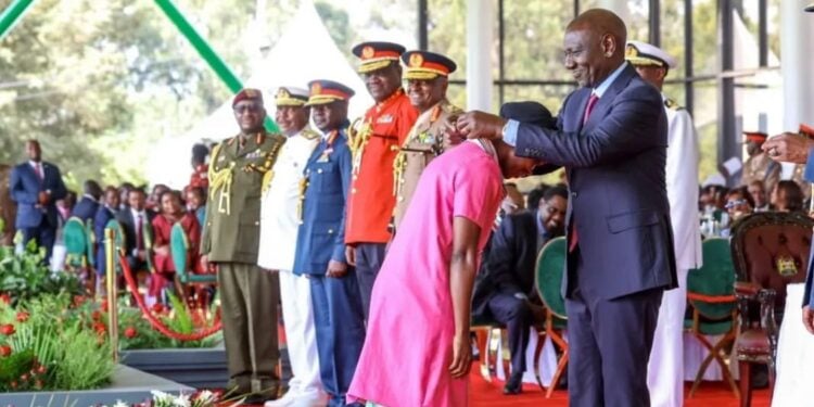 President William Ruto Confers The Ogw Award To Jacky Vike Known As Awinja On December 12, 2023, At State House Nairobi. 