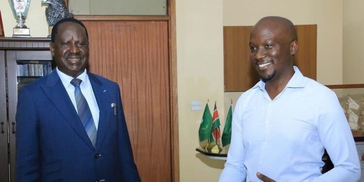 Dennis Onsarigo With Odm Leader Raila Odinga