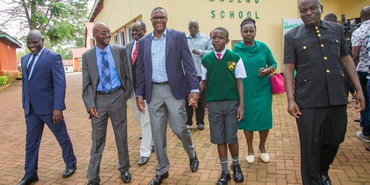 Cs Owalo Pays Full School Fees For Needy Kcpe Candidate Ict Cs Eliud Owalo With David Odhiambo At Maseno School