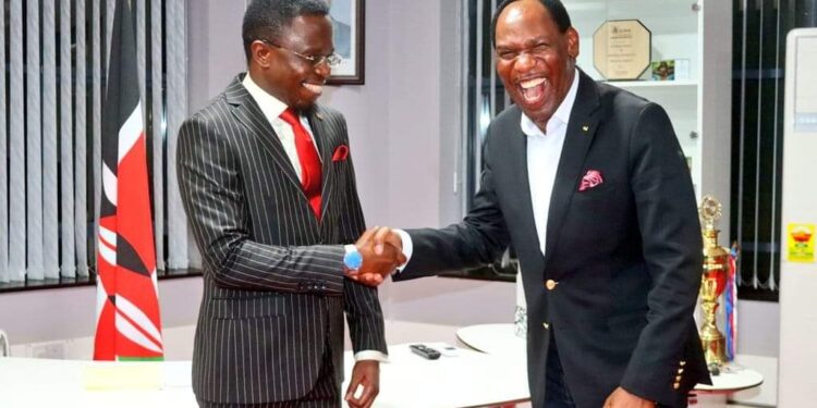 Mcsk Ceo Dr. Ezekiel Mutua With Sports Cs Ababu Namwamba.