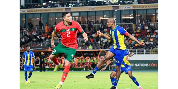 Kenya Beats Tanzania Despite Missing Afcon In Latest Fifa Ranking Morocco'S Defender Achraf Hakimi (L) Fights For The Ball With Tanzania'S Midfielder Himid Mao During The Africa Cup Of Nations 2024 Group F Football Match Between Morocco And Tanzania At Stade Laurent Pokou In San Pedro, Ivory Coast On January 17, 2024.