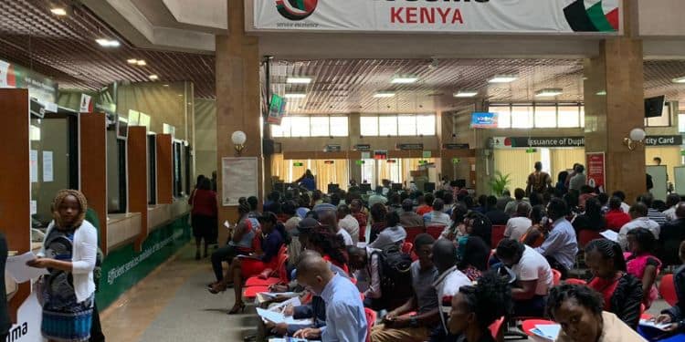 Kenyans Getting Services At A Huduma Centre Office In Kenya. 