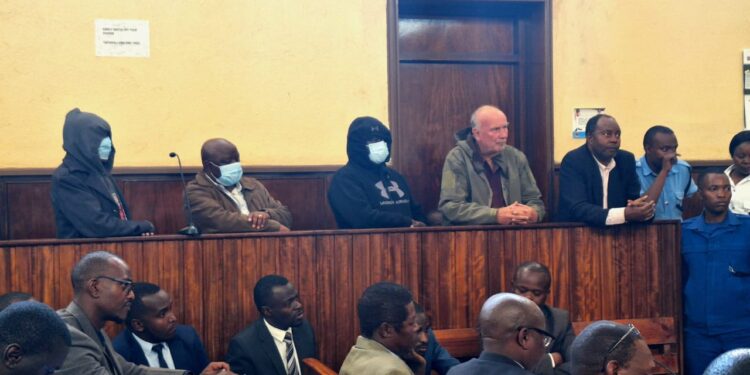 Drama As Kanjos Break Into Hospital, Chase Away Staff &Amp; Patients A Photo Of The Four Persons Arraigned In Court In Connection With Forgery Allegations In The Nakuru War Memorial Hospital Land Dispute.