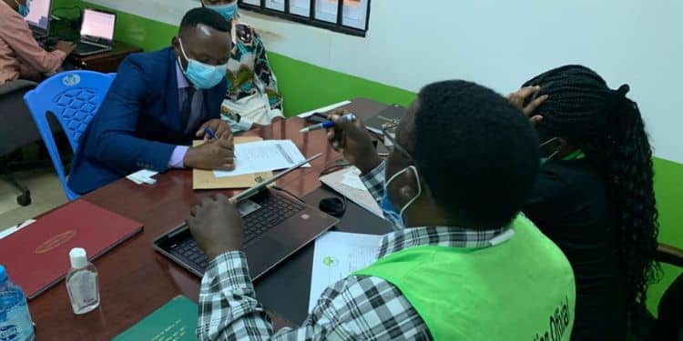 Blogger Derrick Mbugua (Left) Signs A Document While Receiving The Wiper Party Nomination Certificate Ahead Of The 2020 Kahawa Wendani By-Elections.