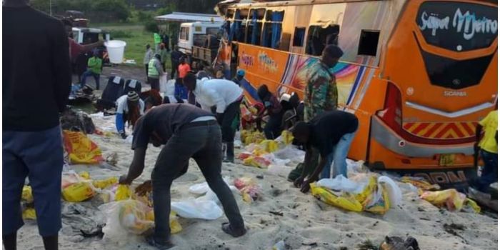 Governor Nyong’o Raises 4 Questions After Two Accidents In Quick Succession Residents Of Othoo Collecting Sugar Remnants Scattered Across The Road After An Accident In Ahero.