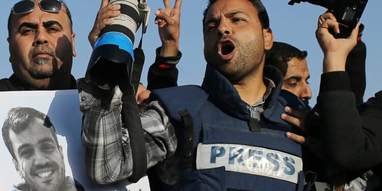 Journalists Take Part In A Protest Against The Killing Of Palestinian Journalist Yasser Murtaja By Israeli Forces At The Israel-Gaza Border, In The Southern Gaza Strip, April 8, 2018.